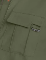 Chest pocket logo detail of Healing Hands Quest Women's Zip-Front Utility Scrub Jacket HH360 in Olive