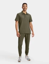 Full-length model view of Healing Hands Quest Men's 3-Pocket Polo Collar Scrub Top HH759 in Olive