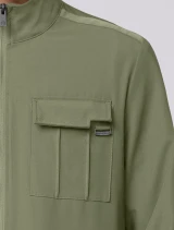 Chest pocket detail of Healing Hands Quest Men's Zip-Front Utility Scrub Jacket HH361 in Olive