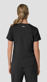 Back side view of a female healthcare worker wearing the women's Carhartt flex panel vneck scrub top C13610 in black
