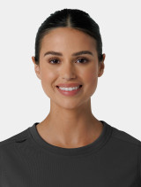 Zoomed in view of the crew neck on the  Carhartt crew neck scrub top C13610 in black