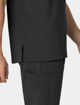 A close up view of the side slit on the Carhartt mens scrub top C16310 in black