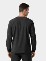 The back of a healthcare worker wearing the Carhartt mens scrub top C16610 in black