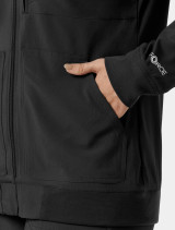 A close up view of the left pocket on the  Carhartt womens scrub jacket C82410 in black