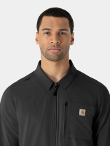 A close up view of the front zipper on the Carhartt mens scrub jacket C86310 in black