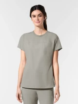 Three-quarter front view of WINK Aura Women's Tuckable Crew Neck Scrub Top 6170 in Cool Gray