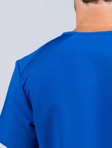Zoomed image of the stretch shoulder yolk panel on the Spirit Scrubs men's 3-pocket V-neck scrub top in royal blue (style #UOT336)