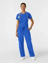 Full-length model view of WINK Boundless Women's Crew Neck Classic Scrub Tee 6451 in Royal