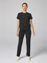 Full-length model view of Healing Hands Quest Women's Tapered Trouser Scrub Pant HH00044 in Black