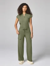 Full-length model view of Healing Hands Quest Women's Wide Leg Drawstring Scrub Pant HH158 in Olive