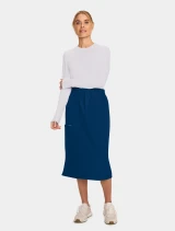 Full-length model view of Cherokee Workwear Originals Ultra Women's Mid Length Cargo Scrub Skirt CK563A in Navy
