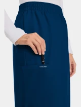 Cargo pocket detail of Cherokee Workwear Originals Ultra Women's Mid Length Cargo Scrub Skirt CK563A in Navy