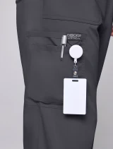 Cargo pocket detail of Cherokee Workwear Revolution Men's 12-Pocket Straight Leg Cargo Scrub Pant CK00001 in Pewter