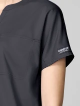 Sleeve logo detail of Cherokee Workwear Revolution Women's Mandarin Collar Dolman Scrub Top CK00038 in Pewter