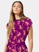 Front view of Med Couture Amp Women's Printed Dolman Scrub Top MC00015 in Into The Wild