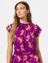 Side view of Med Couture Amp Women's Printed Dolman Scrub Top MC00015 in Into The Wild