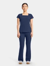 Full-length model view of Med Couture Amp Women's 3-Pocket Square Neck Scrub Top MC704 in Navy