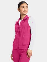 Side view of Med Couture Amp Women's 4-Pocket Zip Front Scrub Vest MC500 in Pink Power