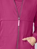 Zipper detail of Med Couture Amp Women's Warm Up Scrub Jacket MC00028 in Pink Power
