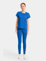 Full-length model view of Med Couture Amp Knit Women's Crew Neck Tee Scrub Top MC751 in Royal