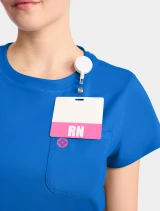 Chest pocket detail of Med Couture Amp Knit Women's Crew Neck Tee Scrub Top MC751 in Royal