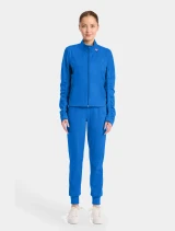 Full-length model view of Med Couture Amp Knit Women's Warm Up Scrub Jacket MC350 in Royal