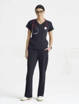 Full-length model view of Grey's Anatomy by Barco Cultivate Women's Spring Scrub Top GRGT309 in Steel