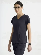 Three-quarter side view of Grey's Anatomy by Barco Cultivate Women's Spring Scrub Top GRGT309 in Steel