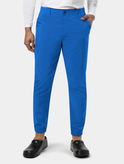 Front view from the waist down of a healthcare worker wearing the Carhartt mens scrub pant C56110 in royal