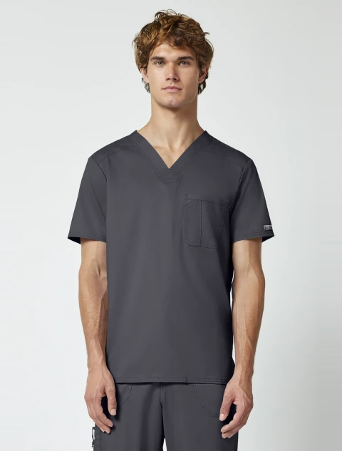 Front view of Cherokee Workwear Revolution Men's Tuckable V-Neck Scrub Top WW690 in Pewter