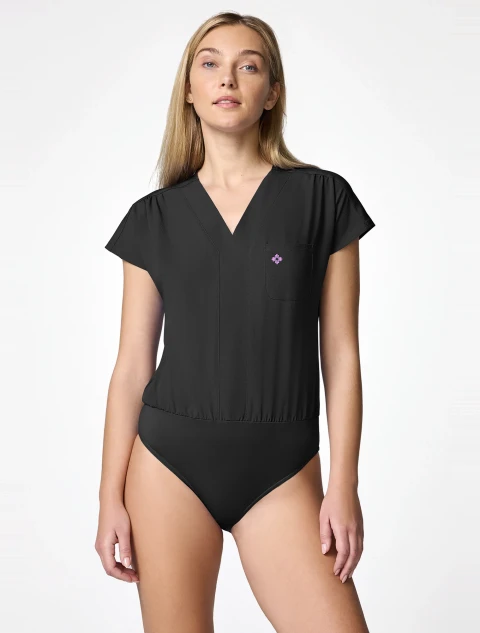 Front view of Med Couture Amp Women's One Pocket Bodysuit Scrub Top MC00017 in Black
