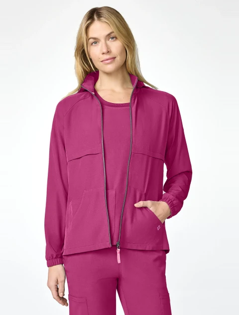 Front view of Med Couture Amp Women's Warm Up Scrub Jacket MC00028 in Pink Power