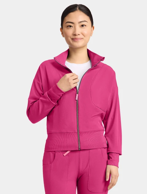Front view of Med Couture Amp Women's Cropped Warm Up Scrub Jacket MC303 in Pink Power