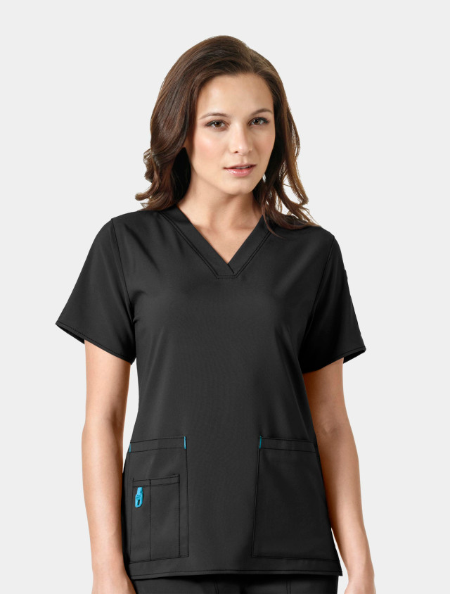 A front view from the waist up of a healthcare worker wearing the Carhartt womens scrub top C12110 in black