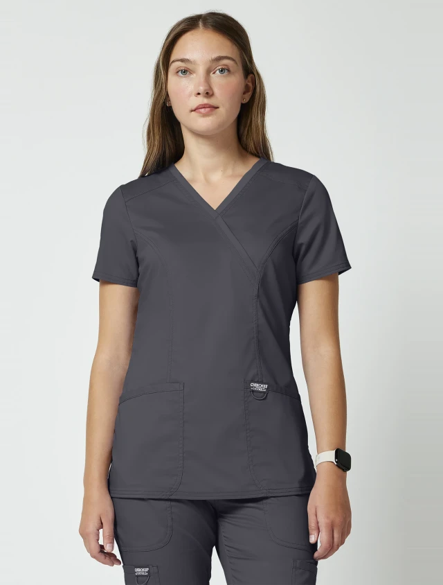 Front view of Cherokee Workwear Revolution Women's Mock Wrap Scrub Top WW610 in Pewter