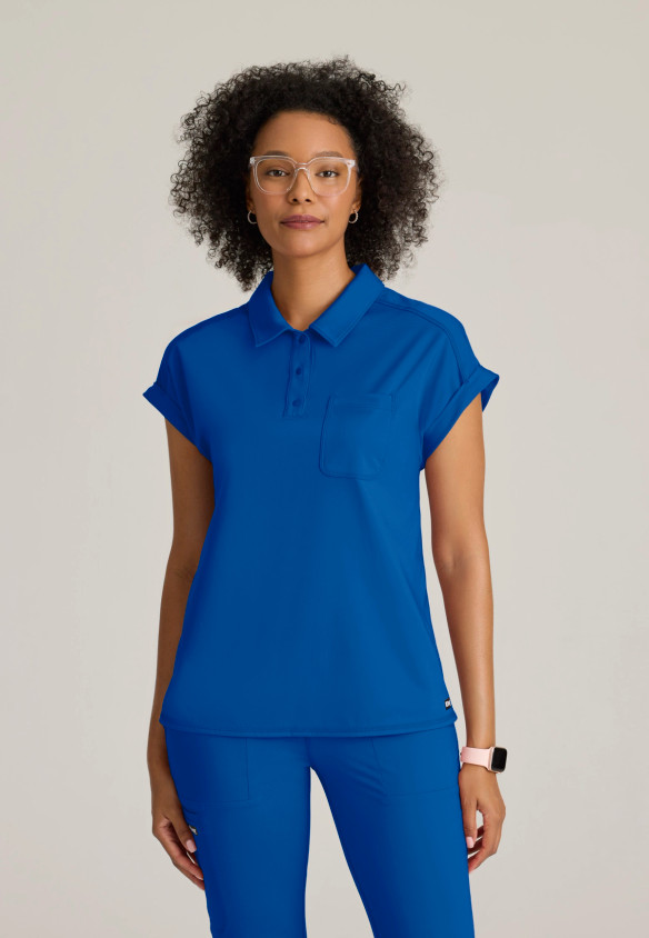 Front view of the Grey's Anatomy Knit-Stretch women's dolman sleeve scrub top GRST254 in royal.