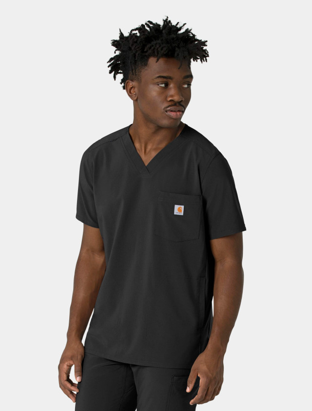 A front view from the waist up of a healthcare worker wearing the Carhartt mens vneck scrub top C16410 in black