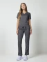 Full-length model view of Cherokee Workwear Revolution Women's Straight Leg Drawstring Cargo Scrub Pant WW105 in Pewter