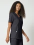 Right side view of Cherokee Workwear Core Stretch Unisex 4 Pocket V-Neck Scrub Top 4725 in Pewter