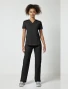 Full-length model view of Cherokee Workwear Professionals Women's V-Neck Top #WW665 in Black