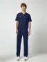 Full-length model view of Cherokee Workwear Professionals Men's V-Neck Top #WW695 in Navy
