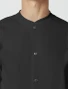 Snap button closure detail of Cherokee Workwear Professionals Men's Snap Front Jacket #WW360 in Black