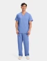 Full-length model view of Cherokee Workwear Originals Unisex 3 Pocket V-Neck Scrub Top 4876 in Ciel