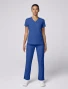 Full-length model view of Med Couture Insight Women's Side Pocket V-Neck Scrub Top MC2468 in Royal
