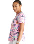 Left side view of women's Cherokee Print top in Dental Life pattern.