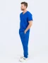 Man wearing the Spirit Scrubs straight leg pants UOB409 and V-neck top UOT333 in royal.
