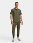 Full-length model view of Healing Hands Quest Men's 3-Pocket Polo Collar Scrub Top HH759 in Olive