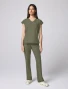 Full-length model view of Healing Hands Quest Women's Built-In-Bra Dolman Scrub Top HH00029 in Olive