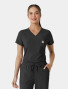 A female healthcare worker wearing the Carhartt tuck-in v-neck scrub top c13410 in black