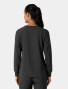 Back side view of a female healthcare worker wearing the Carhartt crew neck scrub top C13610 in black
